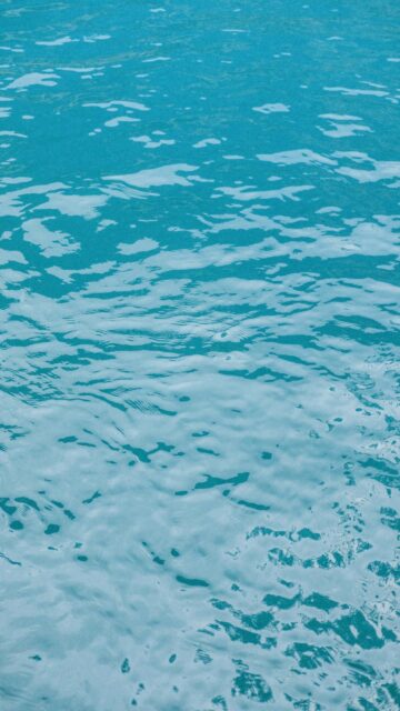 Turquoise Ocean Wallpaper - Gentle Waves and Foam