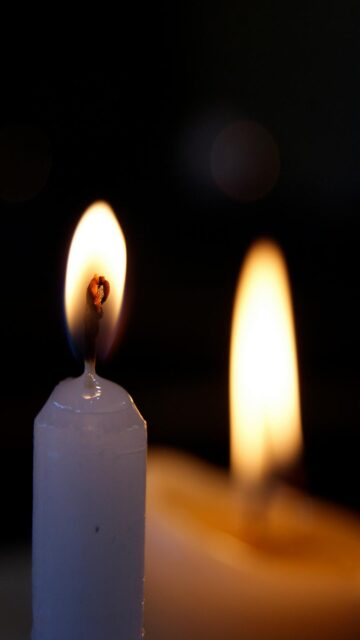 Mystical Ambiance - Two Lit Candles in Dark