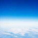 Vast Blue Sky Above White Clouds