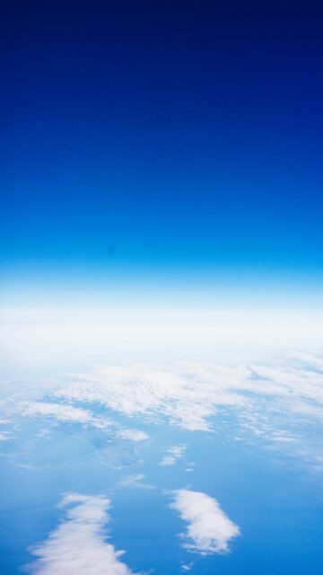 Vast Blue Sky Above White Clouds