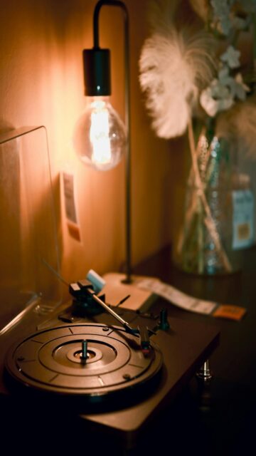 Vintage Record Player With A Glowing Lamp - Perfect Mobile Wallpaper