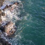 mobile-coast-waves-rocky-sun