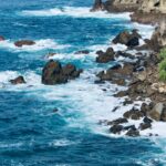 Coastal Bliss - Waves Crash Against Rocky Coastline
