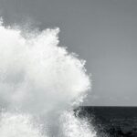 Coastal Bliss - Waves Crashing Against Rocky Shore