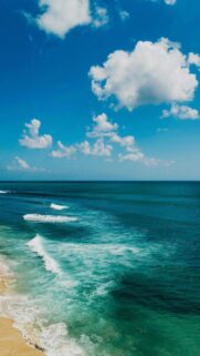 serene-blue-skies-beach-waves