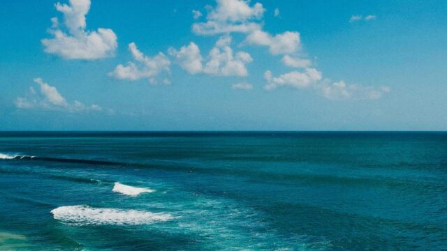serene-blue-skies-beach-waves