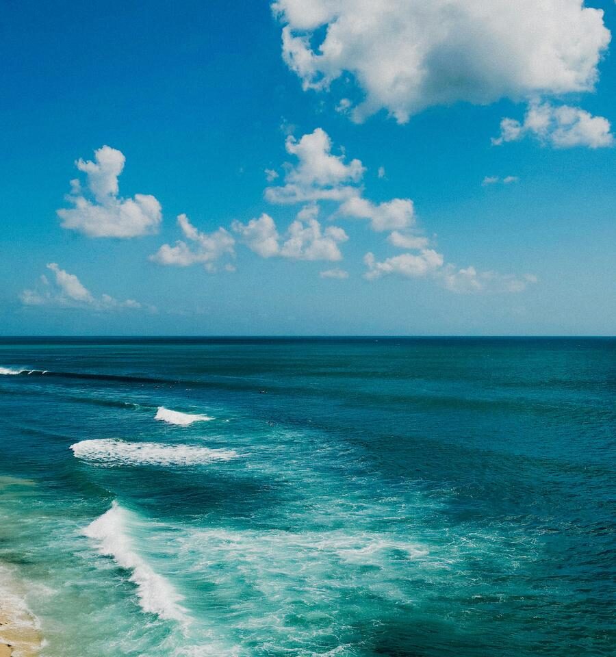 serene-blue-skies-beach-waves