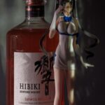 Whiskey And Anime Figures Side By Side