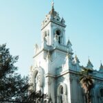 serene-white-church-under-clear-blue-sky