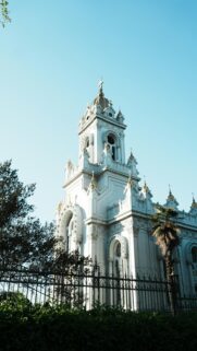 serene-white-church-under-clear-blue-sky