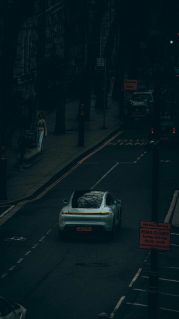 Dark Cityscape with Electric Car