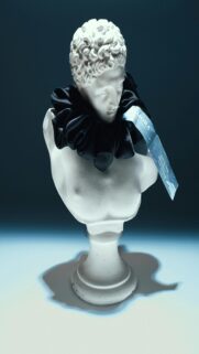 Elegant White Marble Bust with Black Ruffled Collar