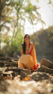 Vibrant India: Woman in Traditional Attire Enjoys Outdoor Moment