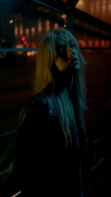 Mysterious Blonde in Moody Darkness