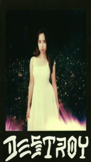 Young Woman In White Dress With Flames Below