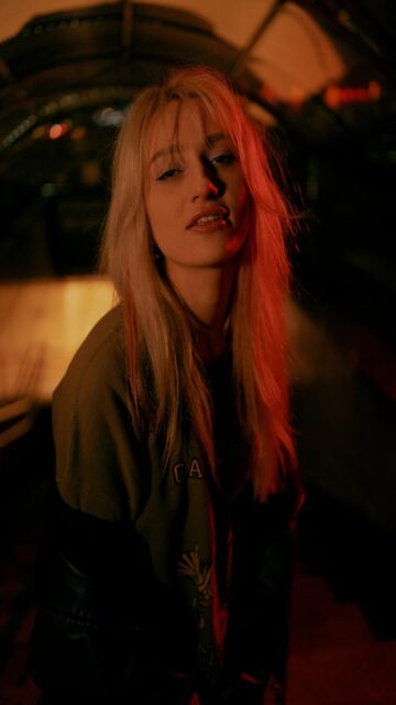Blonde Hair Illuminated By Red Light