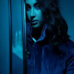 Dark Haired Woman in Blue Jacket Wallpaper