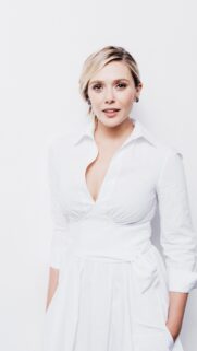 Stunning Elizabeth Olsen Portrait in Elegant White Dress Wallpaper