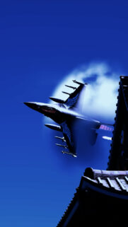 F-16 Fighting Falcon Jet Flying Above Japanese Temple Roof Mobile Wallpaper