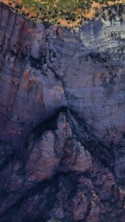 Stunning Aerial View of Majestic Mountain Cliffs Wallpaper for Mobile