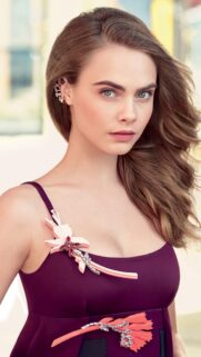 Cara Delevingne Portrait in Purple Dress with Elegant Floral Brooch Mobile Wallpaper