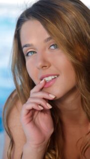 Stunning Portrait of a Beautiful Young Woman with Green Eyes for Mobile Wallpaper