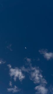 Minimalist Crescent Moon in Deep Blue Sky High Resolution Mobile Wallpaper