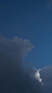 Minimalist Dark Blue Sky With Dramatic Storm Clouds Mobile Wallpaper