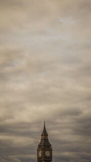 Big Ben London Clock Tower Against Moody Stormy Sky Wallpaper