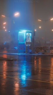 Anime Girl in Glowing Phone Booth Rainy Street Aesthetic Wallpaper