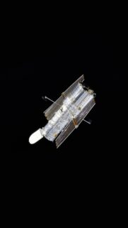 Hubble Space Telescope Floating in Deep Space High Resolution Wallpaper