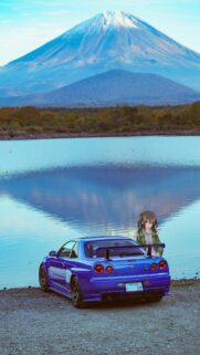 Blue Nissan Skyline R34 GT R with Anime Girl Wallpaper at Mount Fuji Scenic View