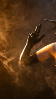 Mysterious Person in Black Latex Gloves with Golden Smoke Aesthetic Mobile Wallpaper
