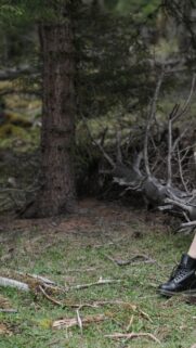 Black Leather Combat Boot in Moody Forest Landscape Wallpaper