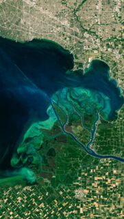 Stunning Satellite View of Coastal River Delta and Turquoise Waters Wallpaper
