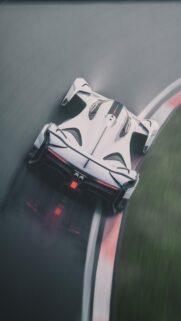 Stunning White Hypercar Racing on Track Vertical Phone Wallpaper