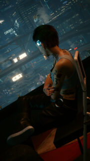 Cyberpunk Cityscape Wallpaper Featuring Edgy Tattooed Character Overlooking Night City