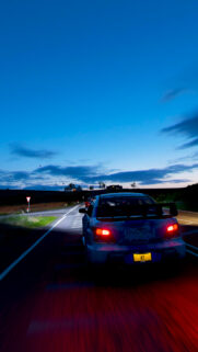 Subaru WRX STI Night Drive Racing Wallpaper for Mobile