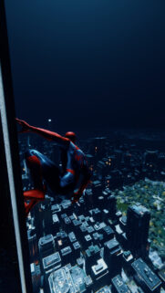 Spider-Man Overlooking New York City at Night Premium Mobile Wallpaper