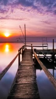 Stunning Wooden Pier at Sunset Mobile Wallpaper – Serene Lake Scenery