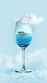 Surreal Tropical Island Inside a Wine Glass with Rainbow Wallpaper