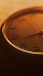 Vintage Pocket Watch Macro Wallpaper with Warm Golden Sepia Tones for Mobile