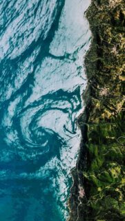 Stunning Satellite View of Coastal Mountain Range and Ocean Waves Mobile Wallpaper