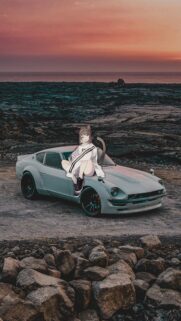 Anime Cat Girl Sitting on Modified Sports Car at Sunset Wallpaper