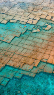 Stunning Teal Water and Ancient Stone Tiles Texture Wallpaper for Mobile