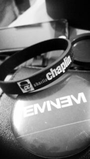 Charlie Chaplin Silicone Wristband and Eminem Pin Badge Monochrome Wallpaper