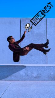 Stylish Man Floating in Surreal Urban Space High Quality Wallpaper