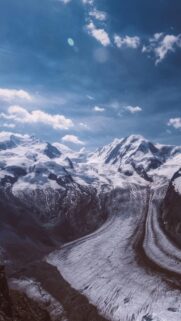 Majestic Snowy Alpine Peaks and Glacier Valley Mobile Wallpaper
