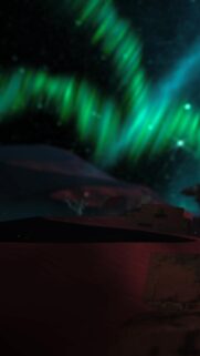 Stunning Aurora Borealis Over Desert Landscape Mobile Wallpaper