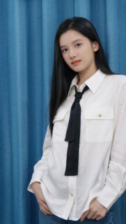 Stunning Asian Girl in White Shirt and Tie Portrait Wallpaper for Mobile